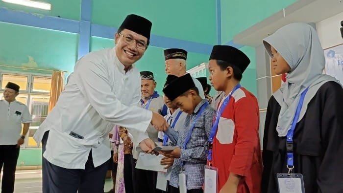 SBI Santuni Yatim Piatu dan Bagikan 3.666 Paket Beras
